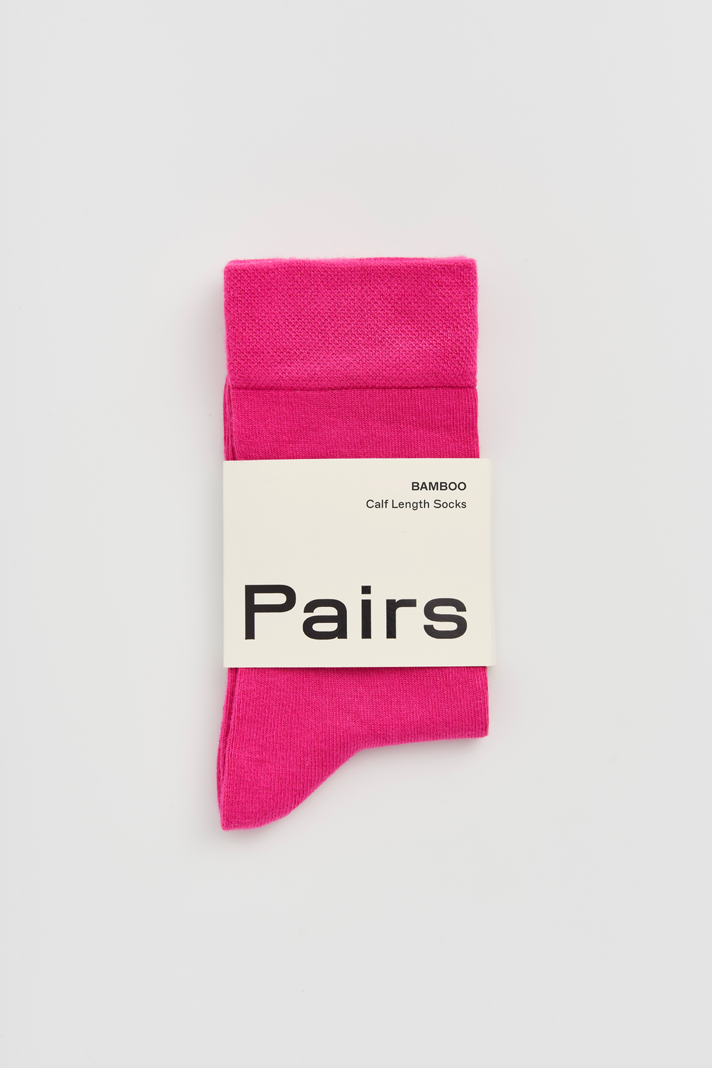 Pink sock with 'Pairs' packaging on a light gray background