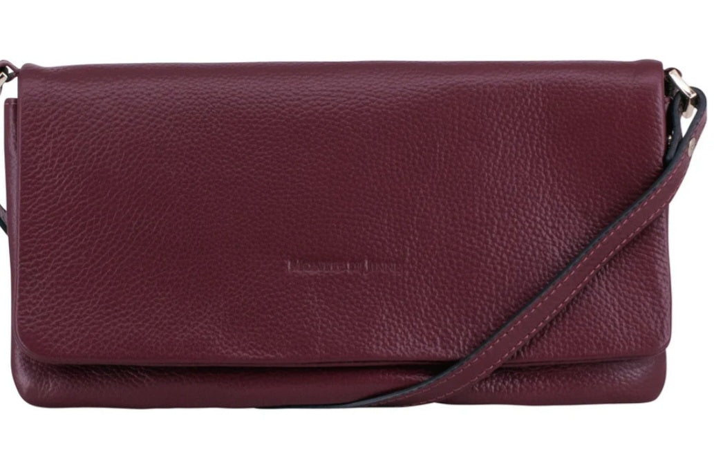 Burgundy envelope style handbag. Front of handbag