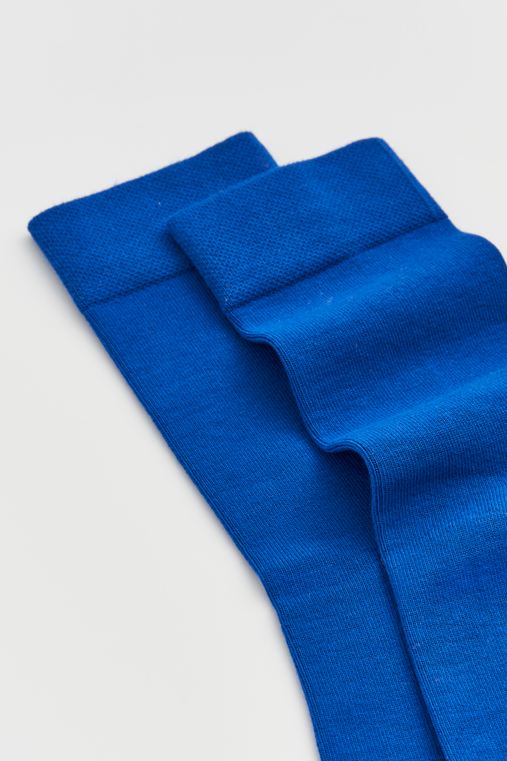 Blue fabric on a light gray background