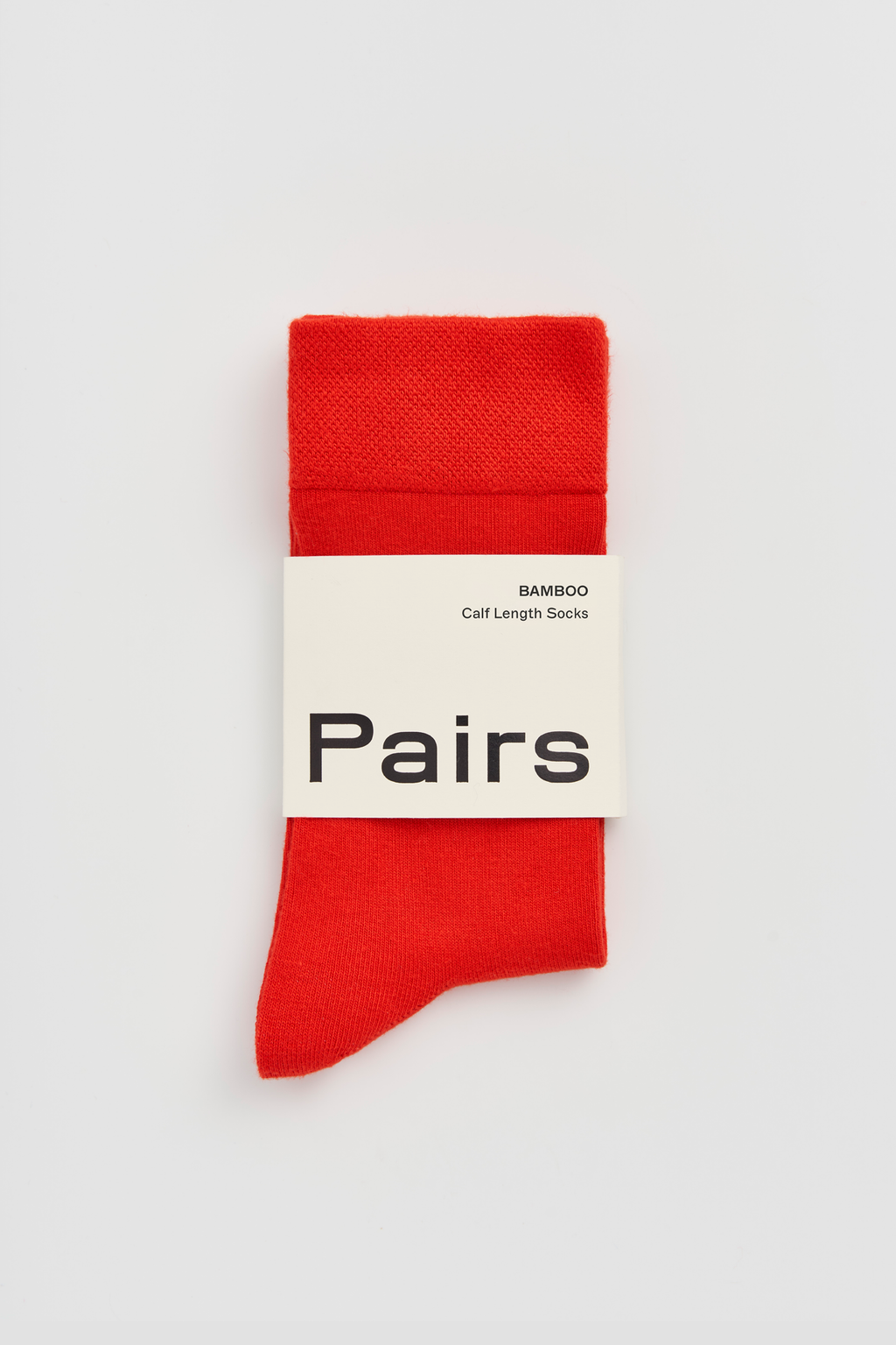 Red sock with 'Pairs' packaging on a white background